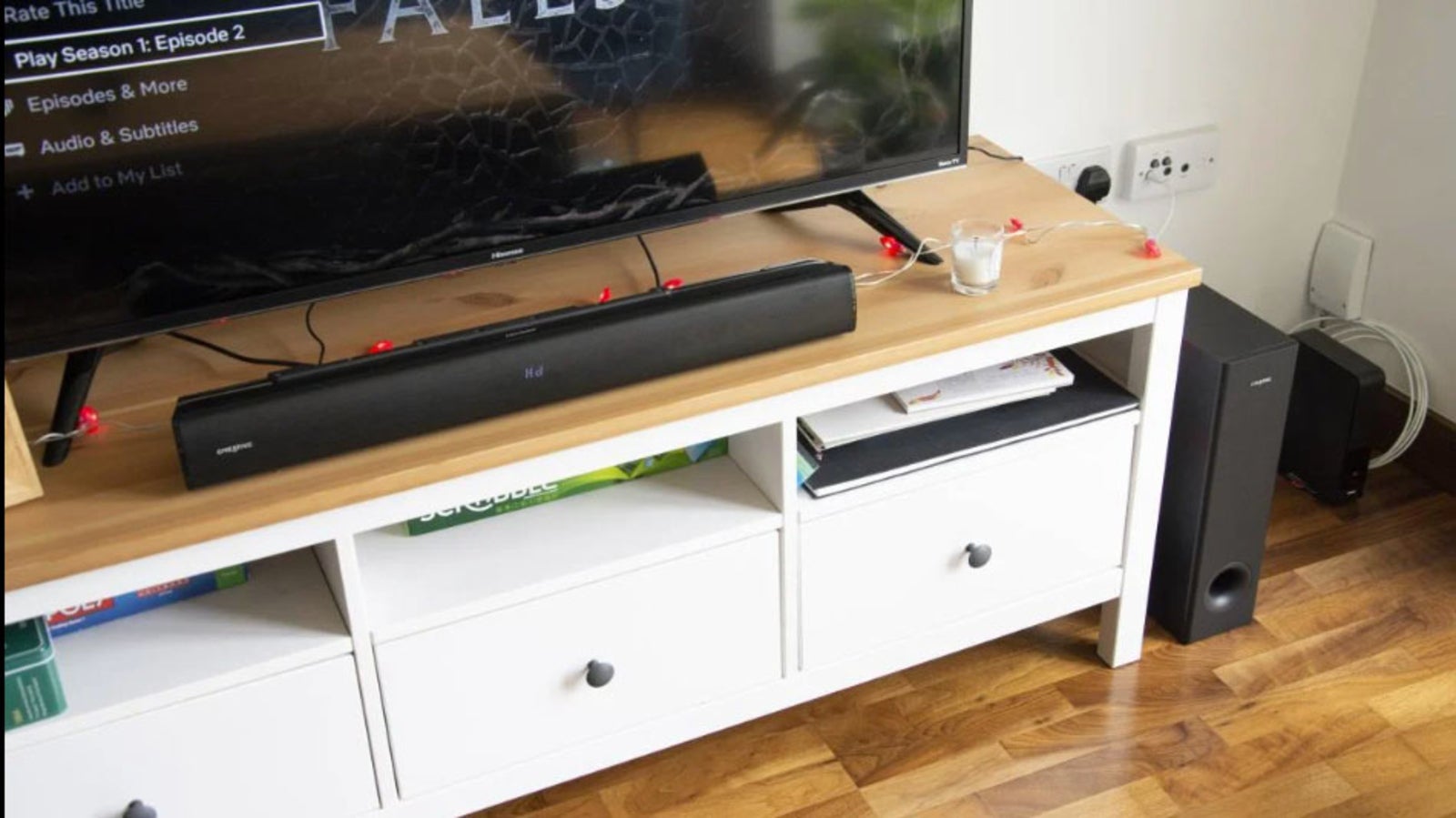 где_поставить_сабвуфер_относительно_саундбара_creative_stage_v2_soundbar_and_subwoofer саундбар на деревянной тумбе