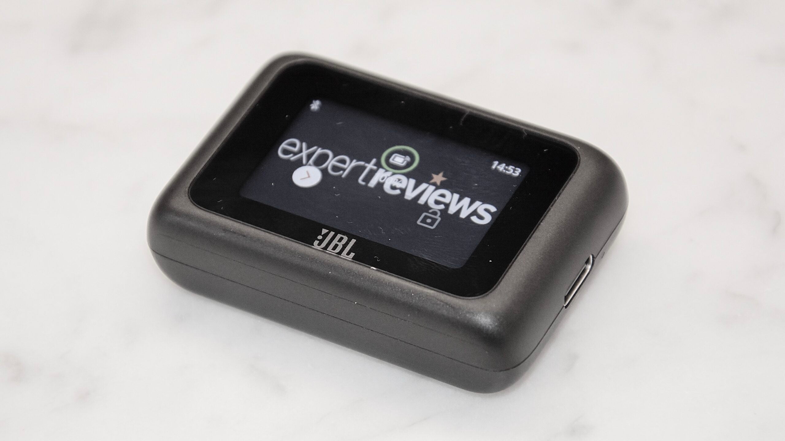 A close up of the JBL Tour ONE M3's Smart RX transmitter module