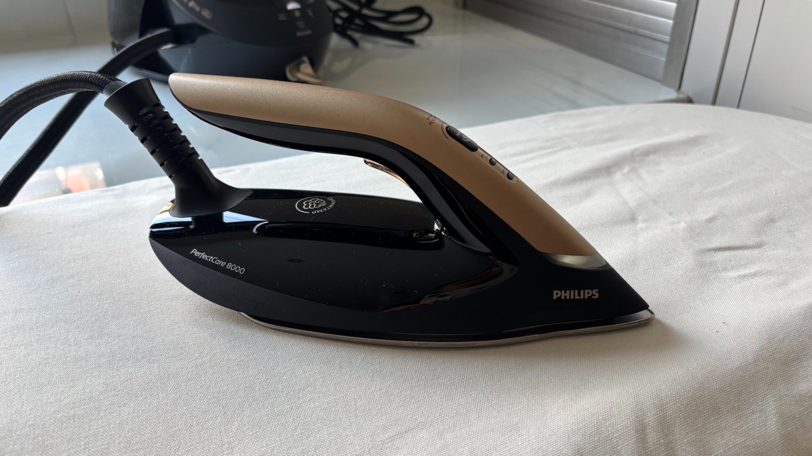 Philips PerfectCare 8000 PSG8130/80 Steam Generator Iron review iron on ironing board